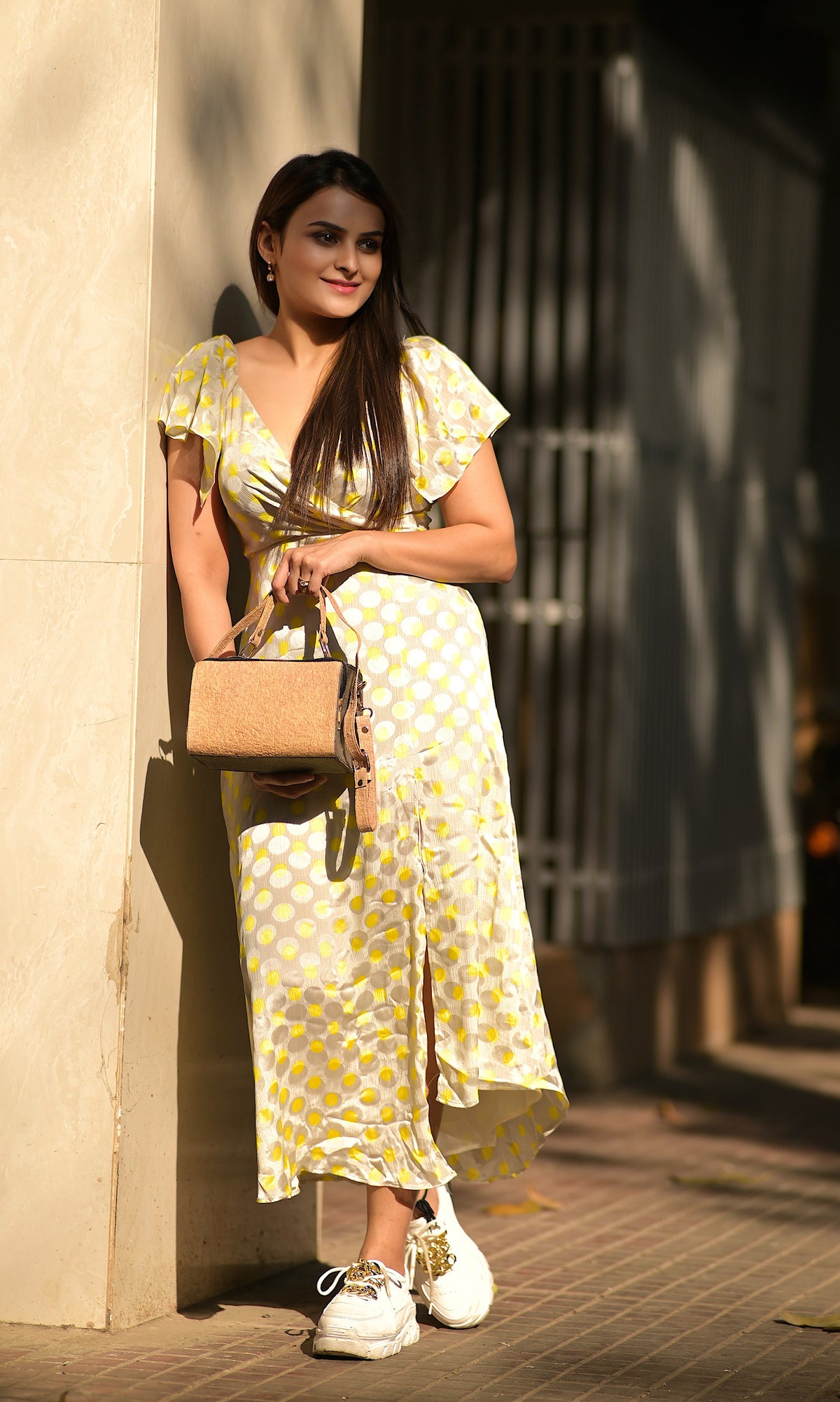 A woman holding Zenkindstore's Mini Duffle Bag